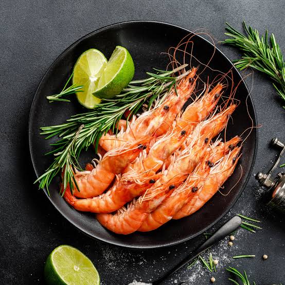 Whole shrimp dish with garlic butter.