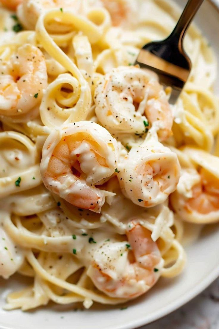 Rich and creamy pasta with shrimp and fresh salsa.